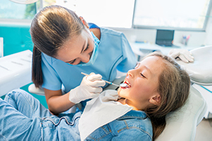 A childing having a dental exam