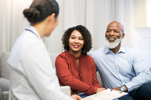 Black Couple speaking with Dentist about Advantages of Bioclear San Francisco Dental Arts 